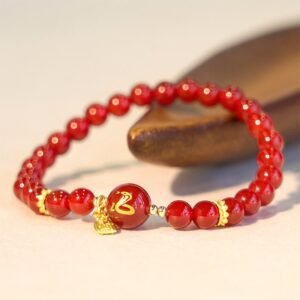 Quiet Warmth, Worn Daily. Red Agate Gold Plated Copper Year Of The Snake Happiness Bracelet by AetherFate