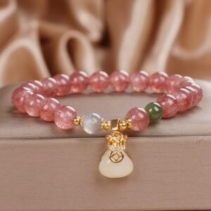 Gentle Clarity, Worn Daily. Strawberry Quartz Money Bag Charm Positive Bracelet by AetherFate