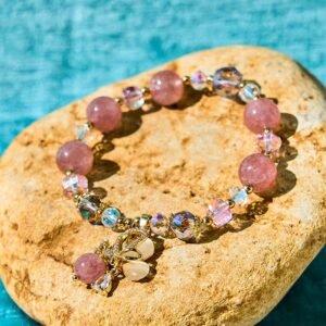 Gentle Clarity, Worn Daily. Strawberry Quartz Butterfly Bracelet by AetherFate