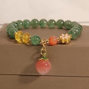 Gentle Clarity, Worn Daily. Green Strawberry Quartz Love Peach Charm Bracelet by AetherFate