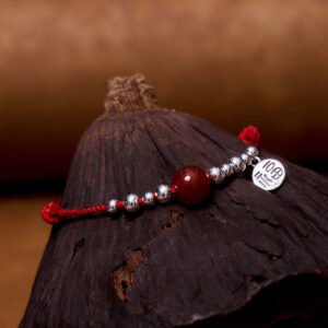 Quiet Strength, Worn Daily. Red Agate Fu Charm