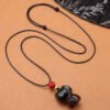 Ebony Cat Charm Necklace | Your Quiet Daily Anchor for Quiet Strength – view 4