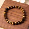 Steady Focus, Worn Daily. Tiger's Eye Cat Charm – view 3