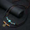 Desk Companion with Turquoise Necklace – view 4
