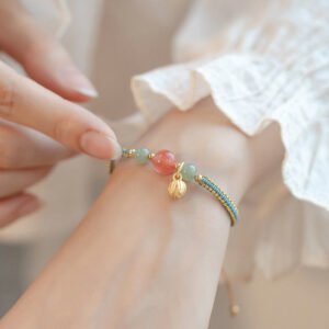 Quiet Strength, Worn Daily. Red Agate Lotus Bracelet
